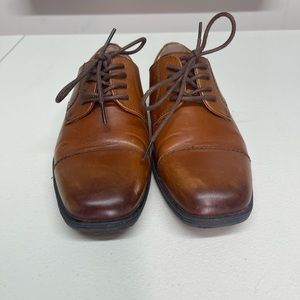 Boys Florsheim leather shoes.